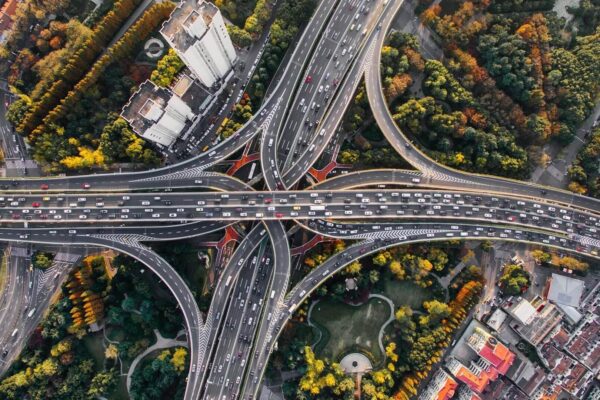 A bird 's eye view of an intersection with multiple lanes.